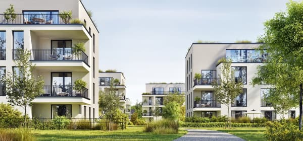 Wohnanlage mit modernen Mehrfamilienhäusern im Grünen