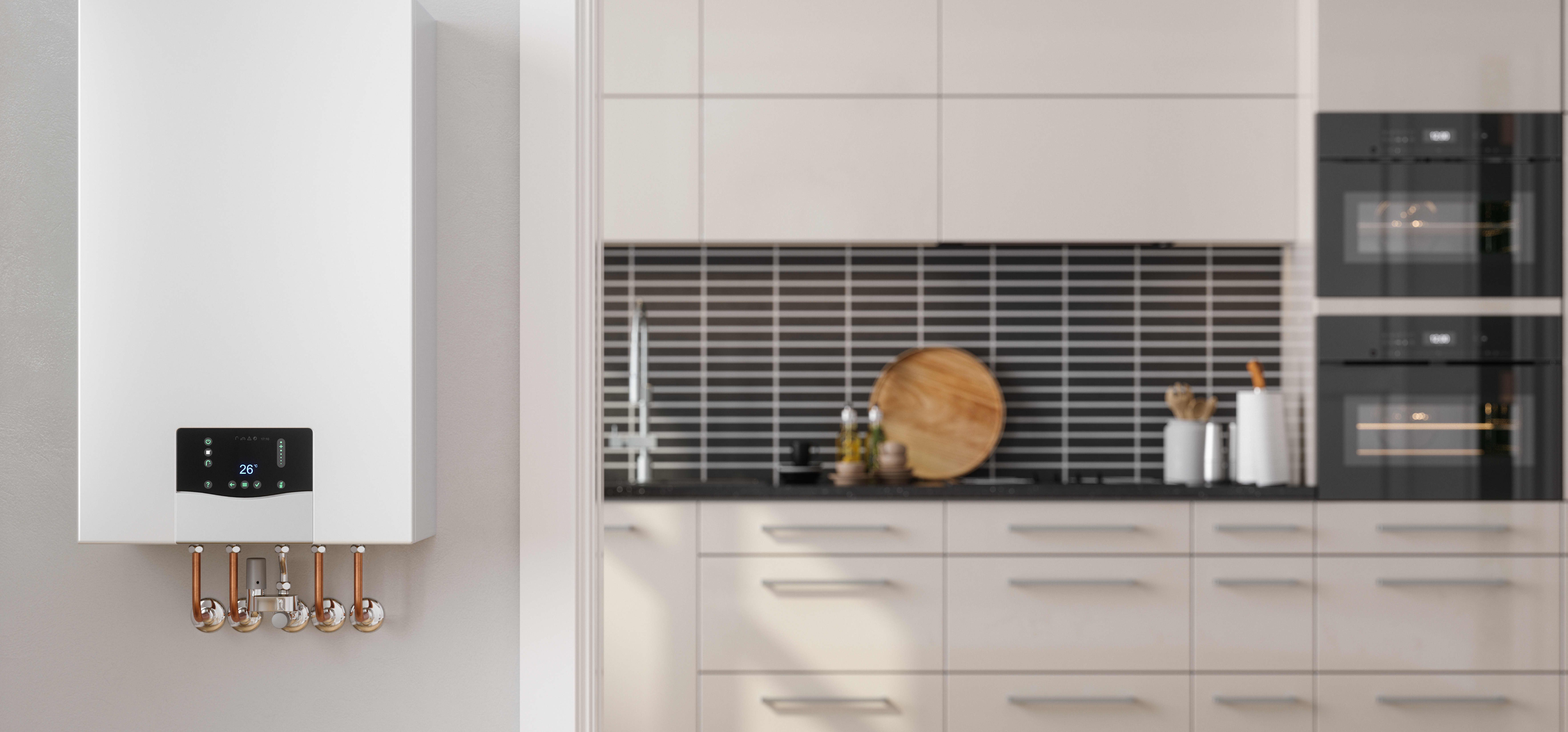 Moderne Gastherme mit weißer Küchenzeile im Hintergrund