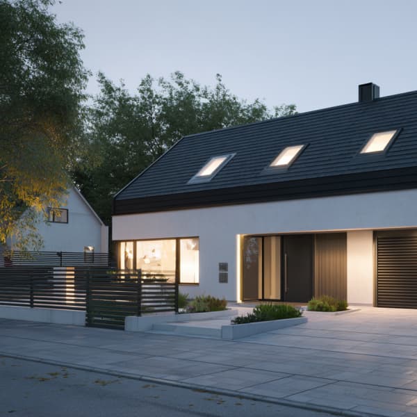 Modernes Haus mit gepflasterter Einfahrt.