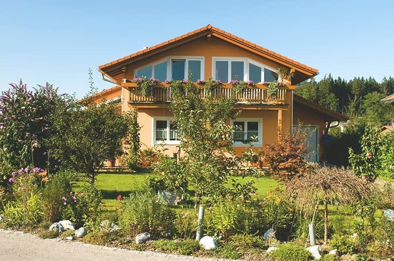 Haus mit grünem Garten