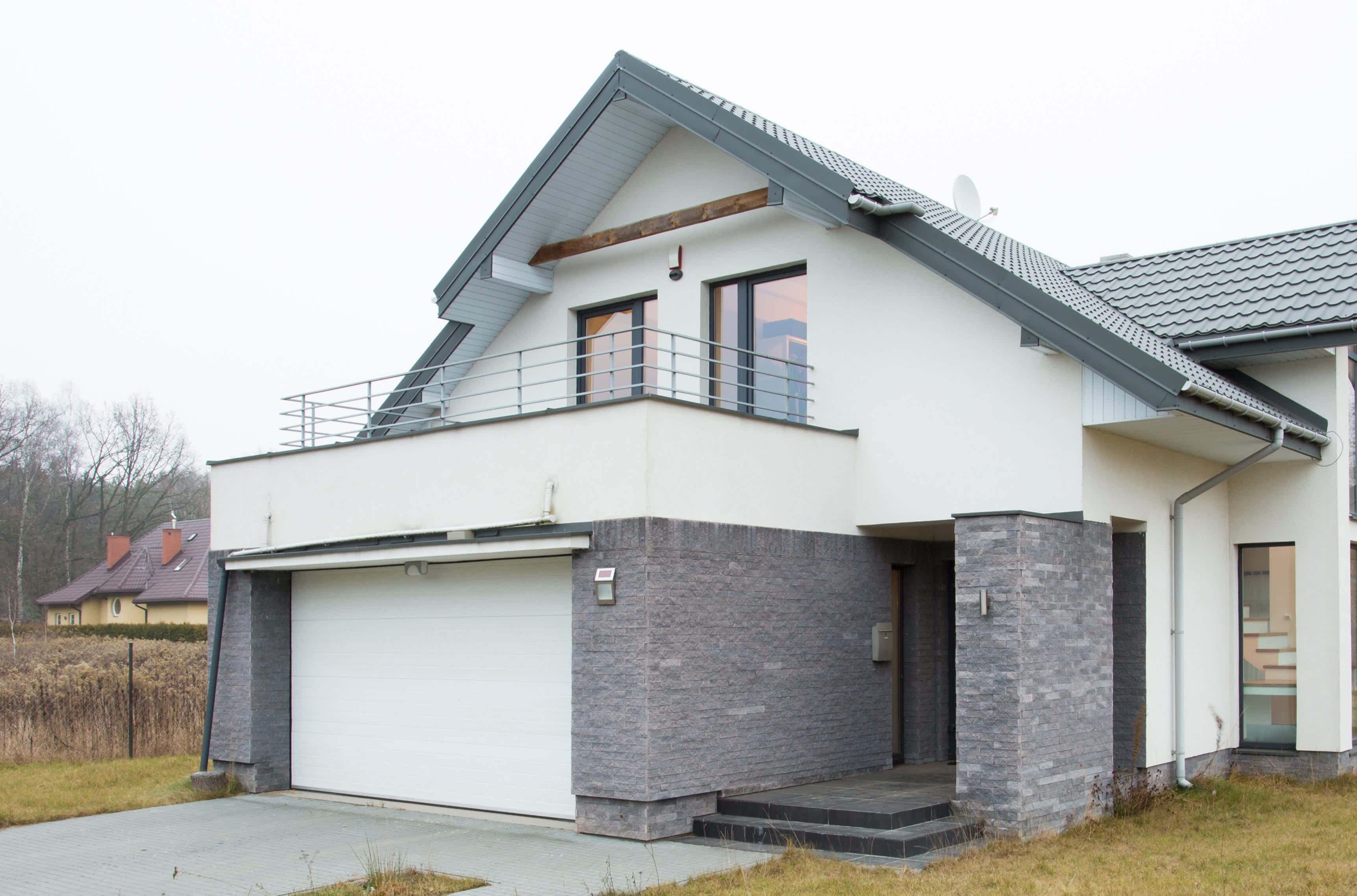 Einfamilienhaus mit Terrasse auf Garagendach