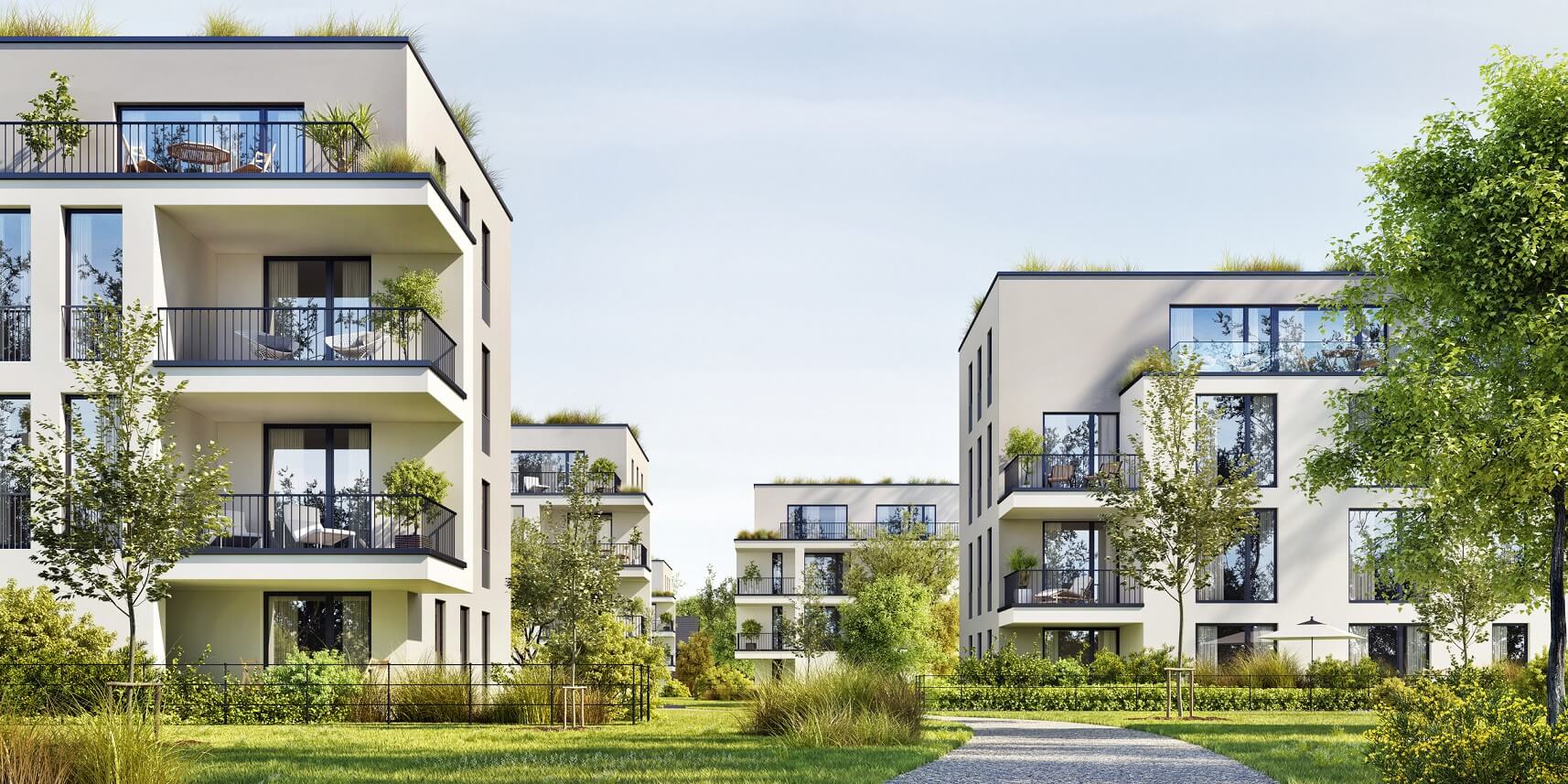 Wohnanlage mit modernen Mehrfamilienhäusern im Grünen