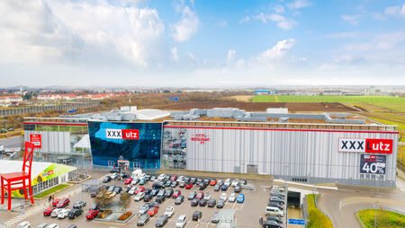 Logo von XXXLutz Aschheim